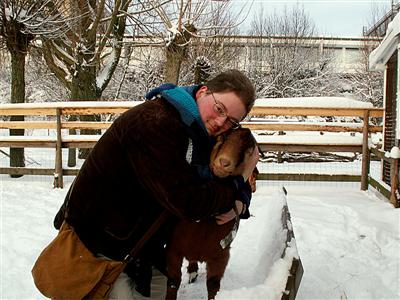 hugging the goat